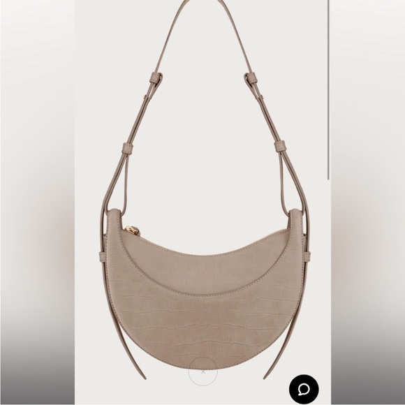 Polène Paris Numéro Dix
EDITION CROCODILE
NUBUCK TAUPE - Picture 2 of 7